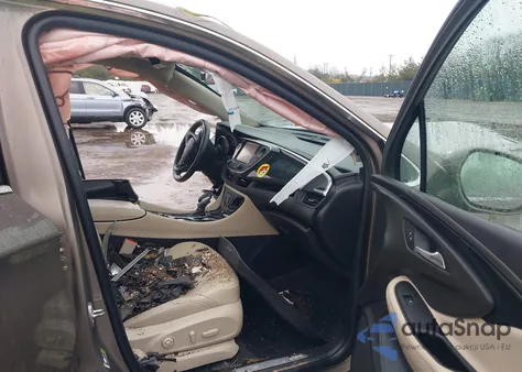 2017 Buick Envision Essence z USA, uszkodzony, nr VIN LRBFXDSA3HD099581